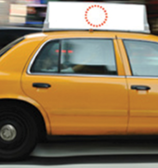 taxi ads in traffic around Philadelphia
